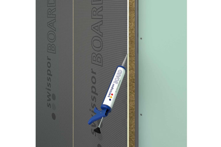 Montage d'un panneau isolant avec de la colle