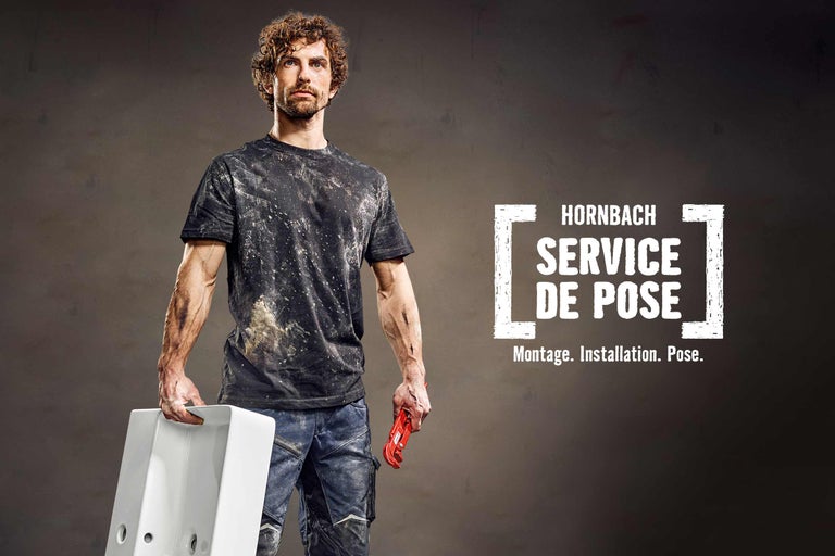 Artisan avec outil et logo Hornbach Service de Pose