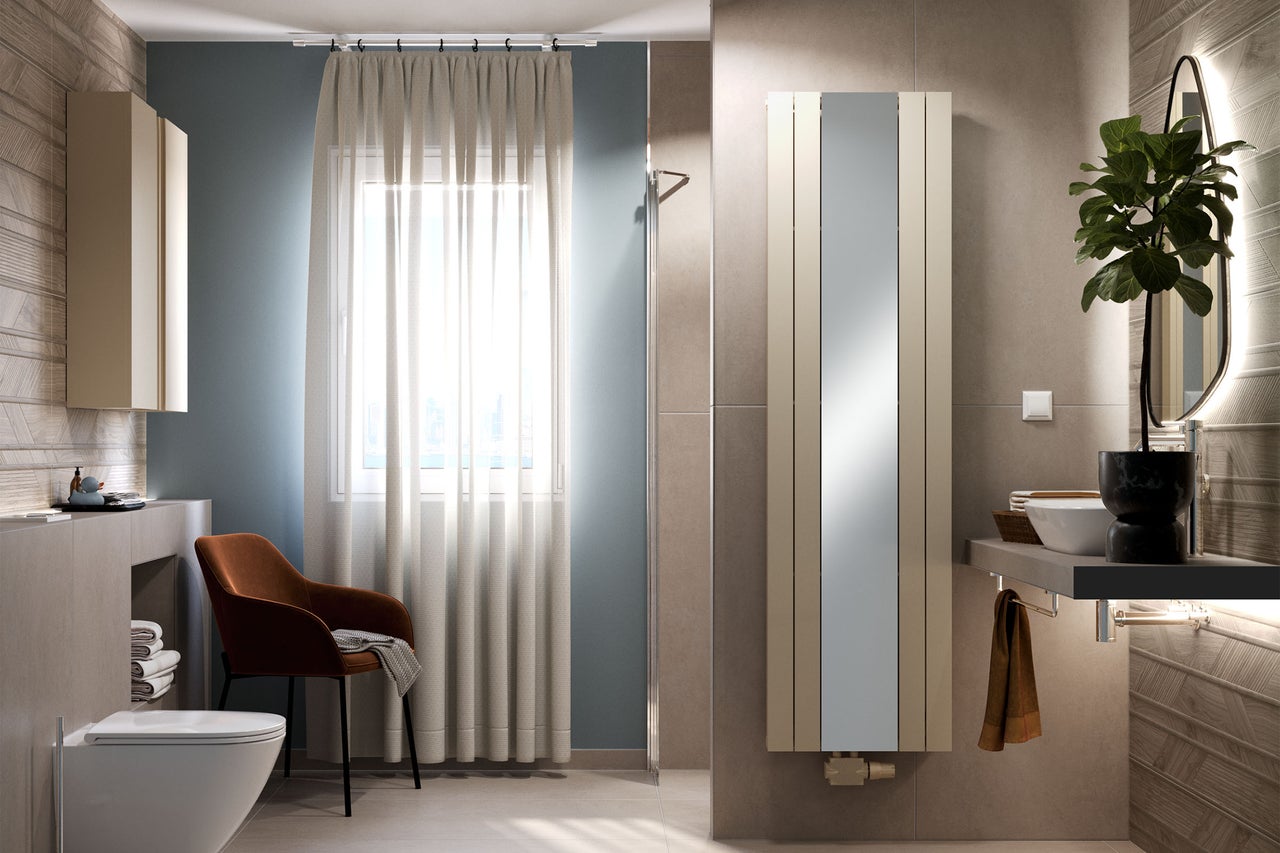 Salle de bain moderne avec toilettes, lavabo, radiateur et chaise