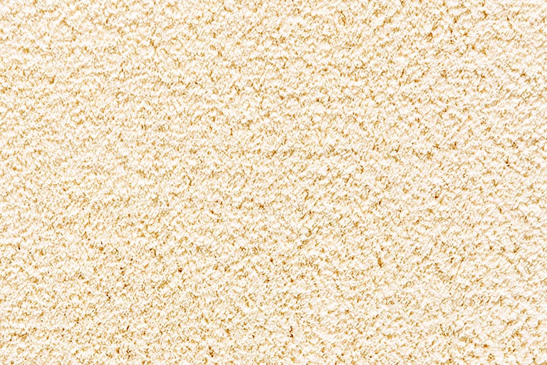 Gros plan d'un tapis beige