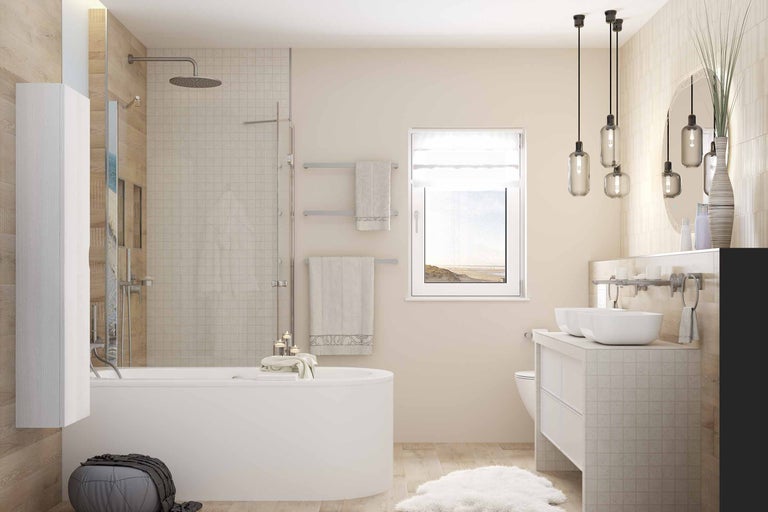 Salle de bain lumineuse avec baignoire, douche, lavabo et fenêtre