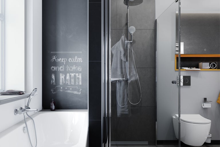 Badezimmer mit Badewanne, Dusche und Toilette im modernen Design
