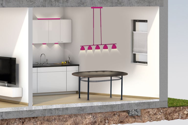 Querschnitt eines Hauses mit Küche, Essbereich und Fundamentdämmung