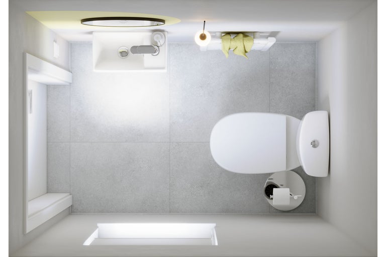 Salle de bains moderne et lumineuse vue de dessus avec carrelage gris, WC blanc, lavabo avec robinet et radiateur sèche-serviettes.