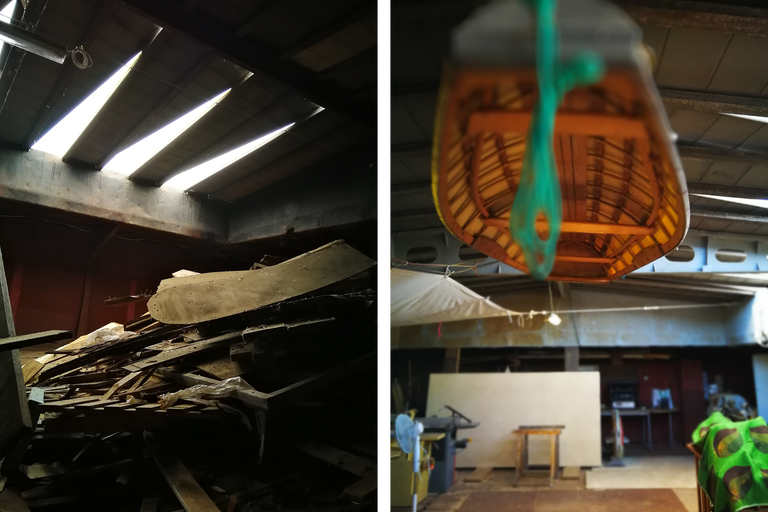 Atelier avec des restes de bois et une coque de bateau suspendue