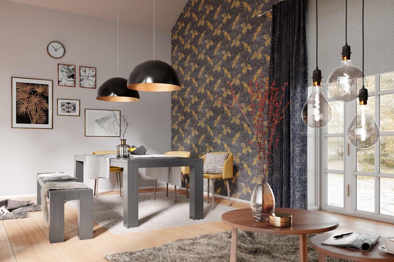 Salle à manger avec table, chaises, banc, suspensions et décoration