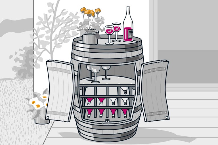 Casier à vin en forme de tonneau avec vin, verres et fleurs