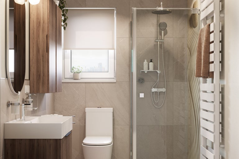 Salle de bain lumineuse avec douche, lavabo, armoire de toilette et toilettes
