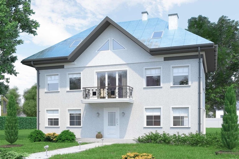 Vue d'une maison à deux étages avec balcon et fenêtres de toit