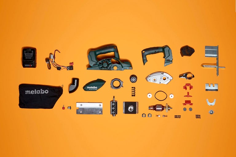 Explosionsdarstellung eines Metabo Hobels mit Zubehörteilen.