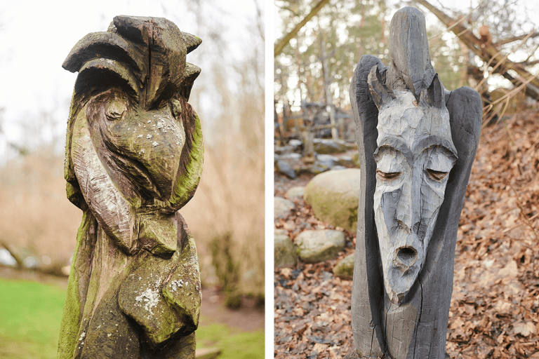 Deux statues en bois sculptées à l'extérieur