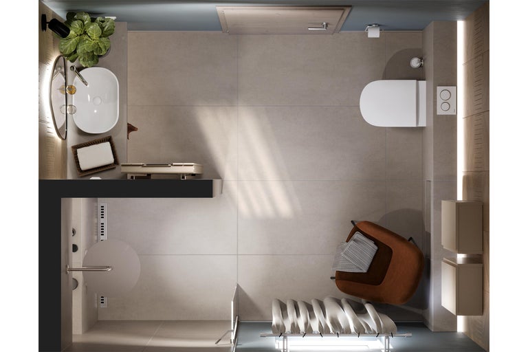 Vue de dessus d'une salle de bains lumineuse avec toilettes, lavabo, sèche-serviettes et fauteuil