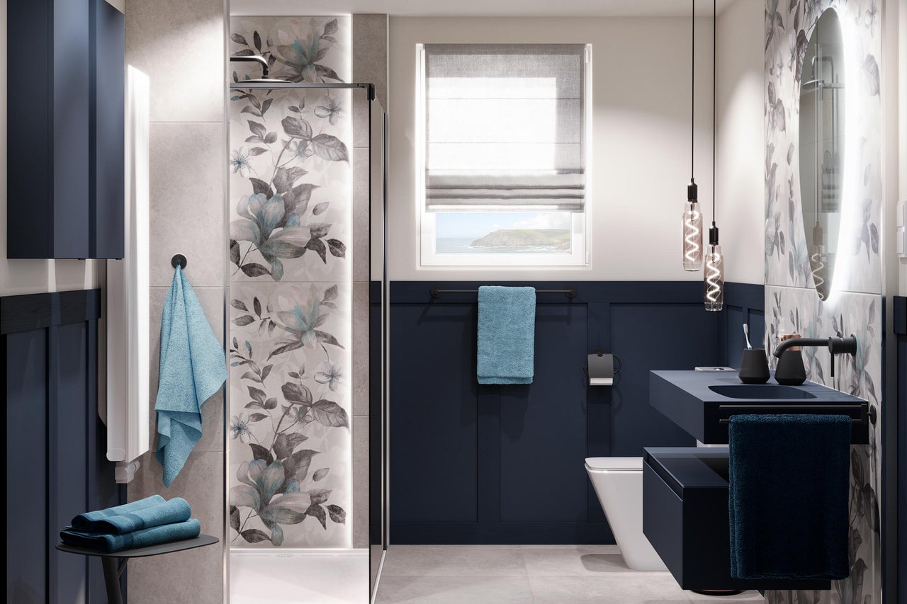 Modernes Badezimmer mit Dusche, Waschtisch, Spiegel und floralen Akzenten