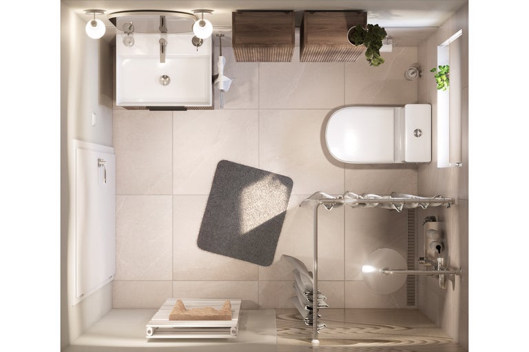 Vue aérienne d'une salle de bains lumineuse avec lavabo, toilettes, radiateur et accessoires de salle de bains