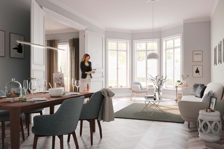 Salon lumineux avec table à manger, chaises et coin salon