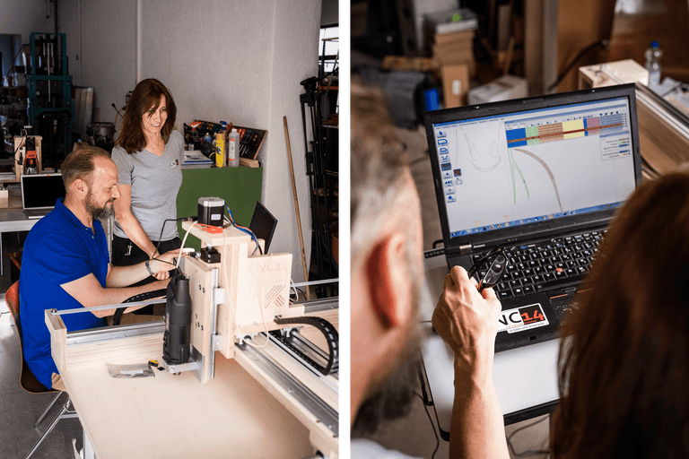 Deux personnes travaillent sur une fraiseuse CNC; une personne utilise un ordinateur portable avec un logiciel CNC.