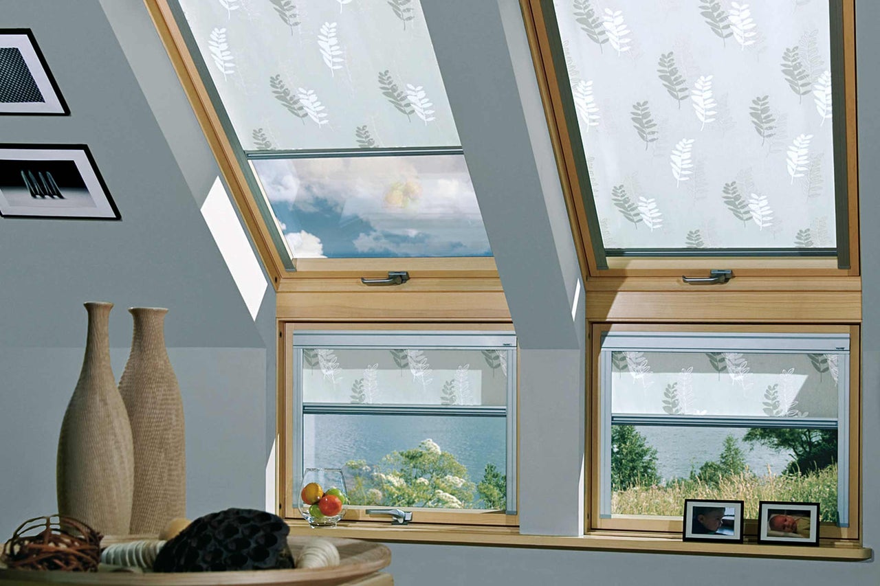 Fenêtres de toit avec stores occultants à motif floral pour une meilleure protection solaire