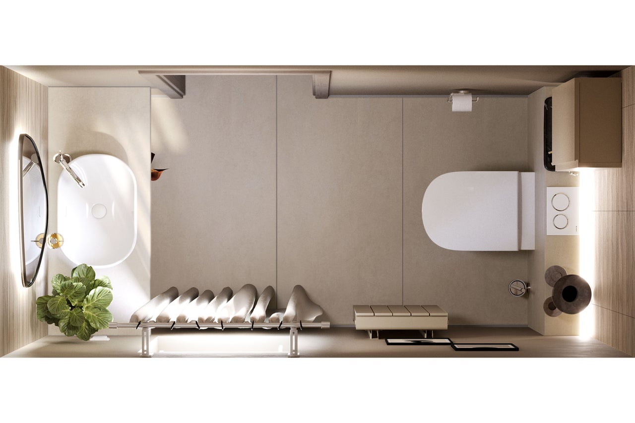 Vue aérienne d'une salle de bains avec lavabo, toilettes, miroir et banc