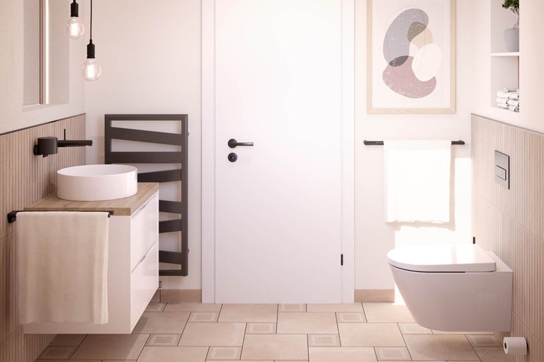 Salle de bain lumineuse avec meuble-lavabo, sèche-serviettes et WC suspendu