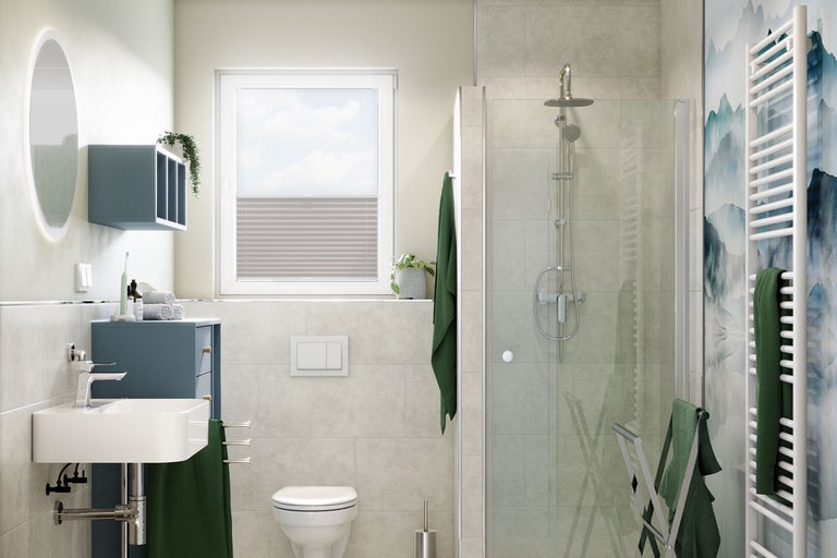 Helles Badezimmer mit Dusche, Waschbecken, Toilette und Heizkörper