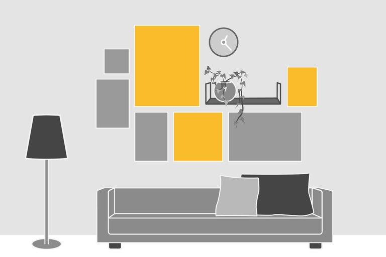 Wohnzimmer mit Sofa, Stehlampe, Wandregal und Bilderrahmen