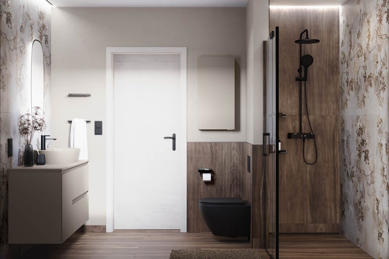 Modernes Badezimmer mit Waschtisch, Toilette und Dusche.