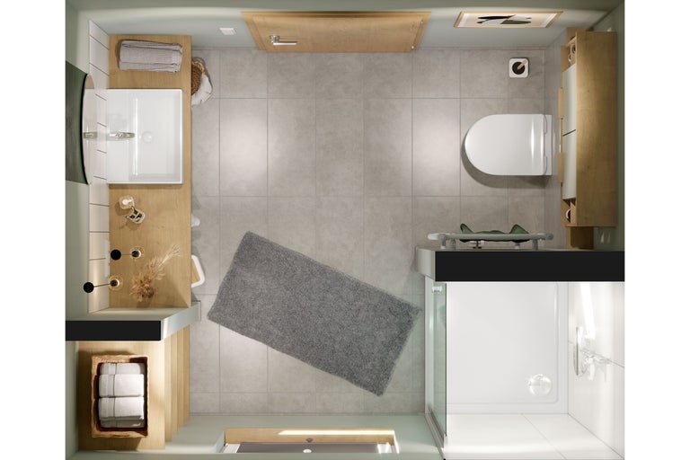 Draufsicht eines Badezimmers mit Waschbecken, Toilette und Dusche