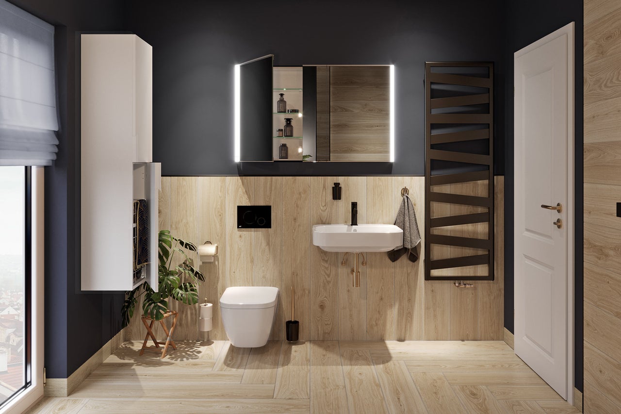 Salle de bain moderne avec carrelage aspect bois, toilette suspendue, lavabo, armoire de toilette éclairée et radiateur sèche-serviettes.