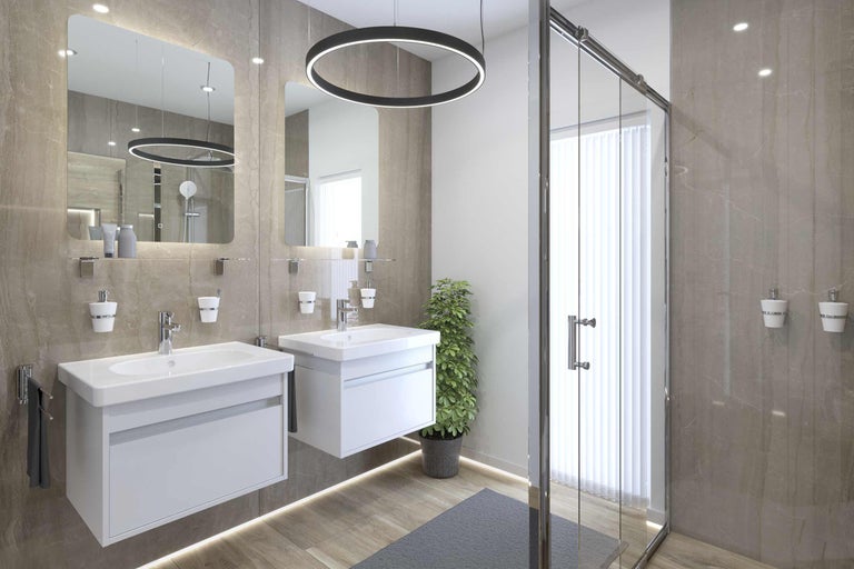 Badezimmer mit zwei Waschbecken, Spiegeln und Duschkabine