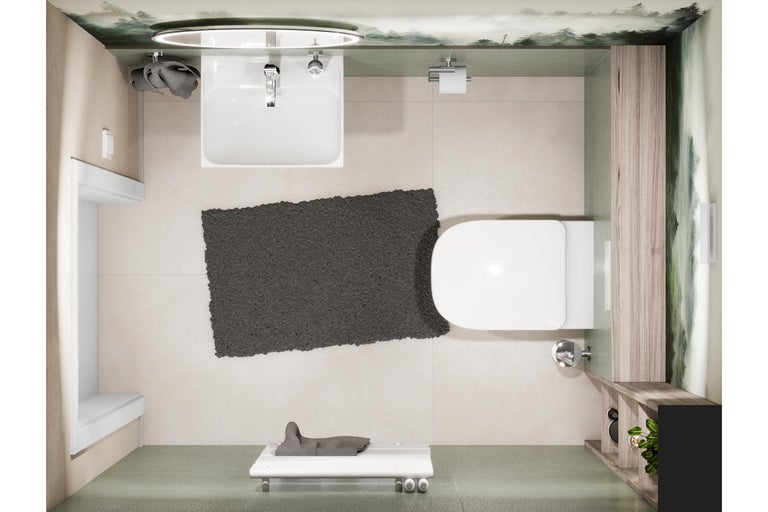 Vogelperspektive eines Badezimmers mit Waschbecken, Toilette und Badteppich