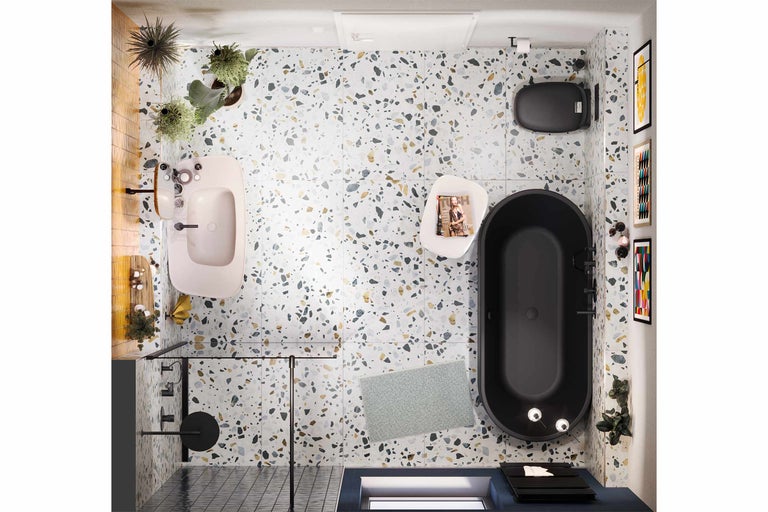 Vue plongeante d'une salle de bains avec baignoire, lavabo, toilettes et carrelage