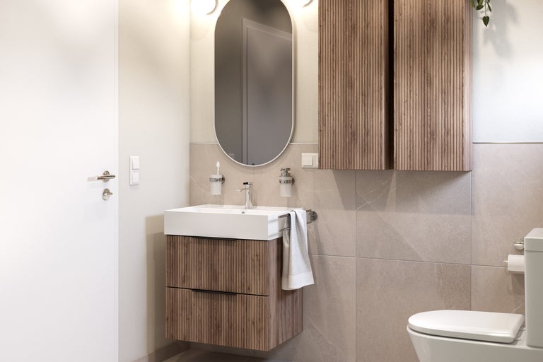 Salle de bain moderne avec lavabo, miroir et armoire suspendue