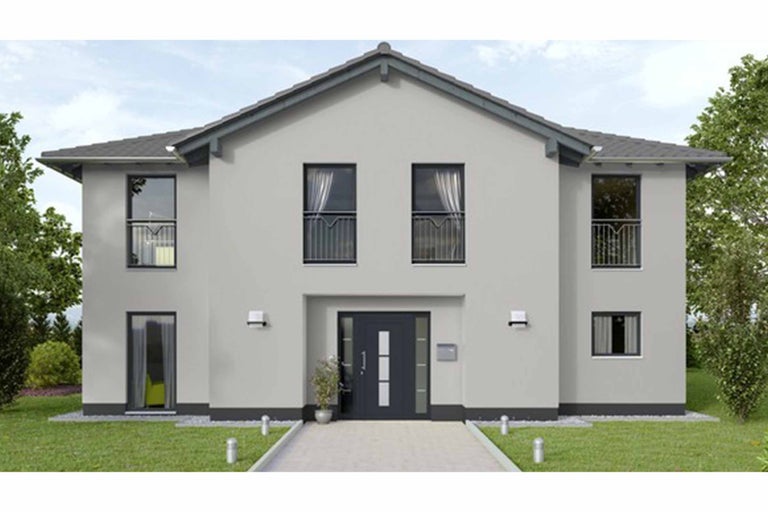 Vue d'une maison individuelle moderne avec fenêtres, porte d'entrée et toit