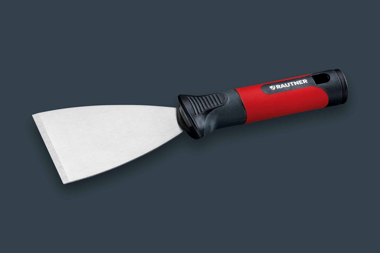 Spatule avec lame en acier et manche en plastique