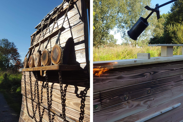 Holzkonstruktion mit Dekorationsgegenständen und Flammen