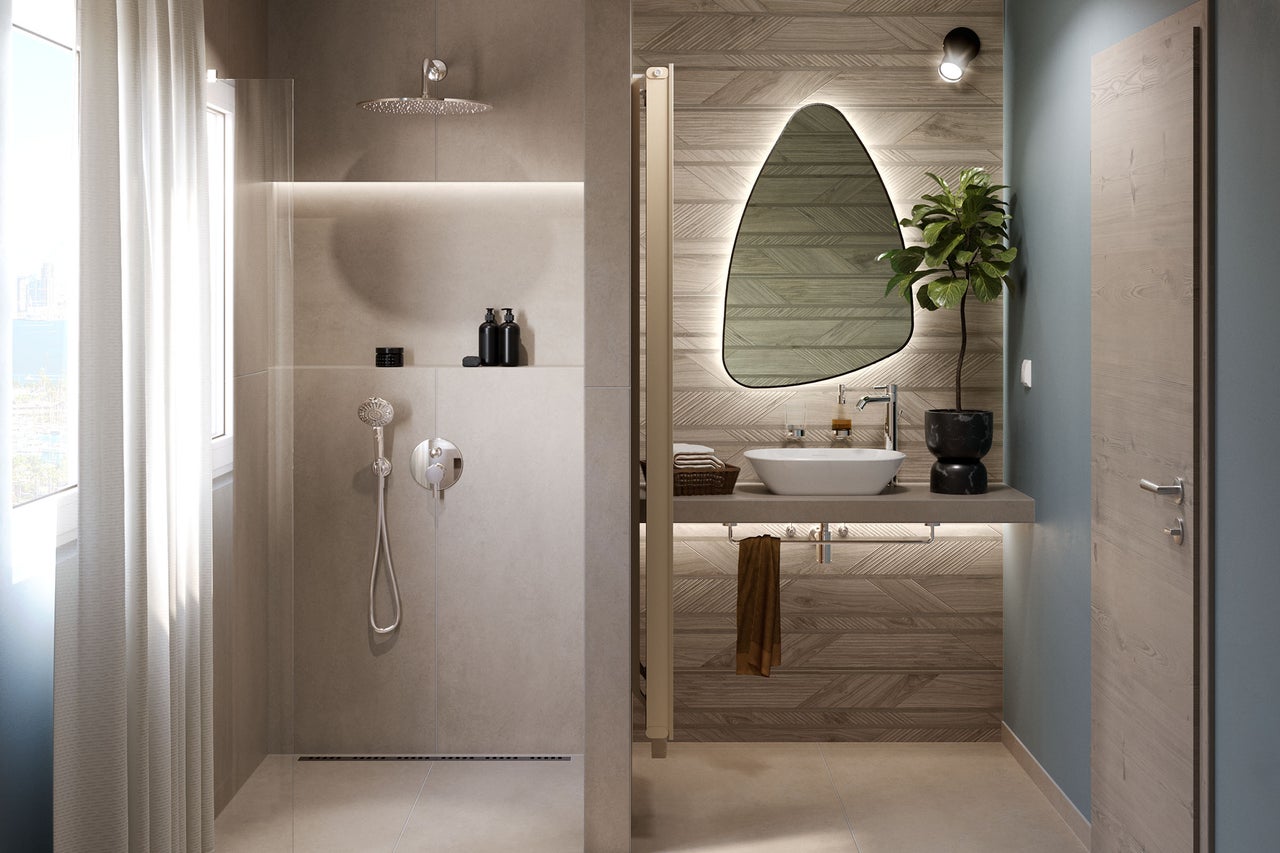 Salle de bain moderne avec douche, lavabo et miroir