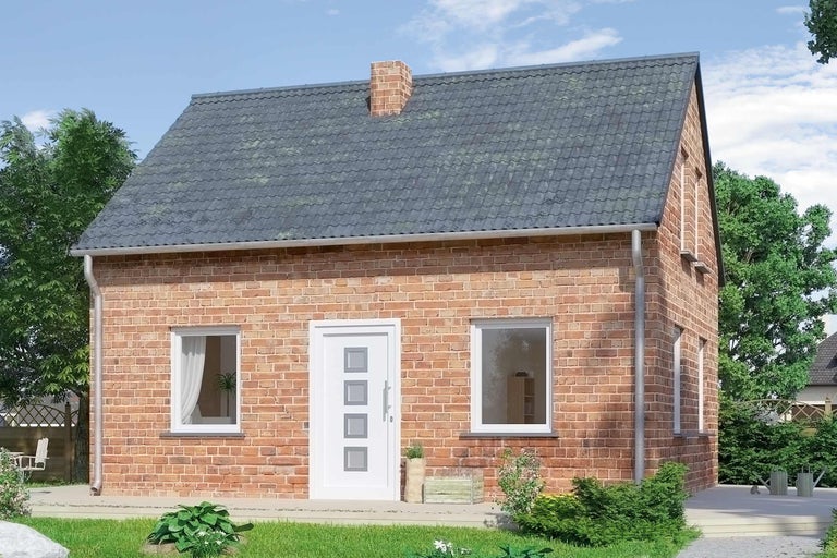 Vue d'une maison individuelle avec une façade en briques et un toit en tuiles