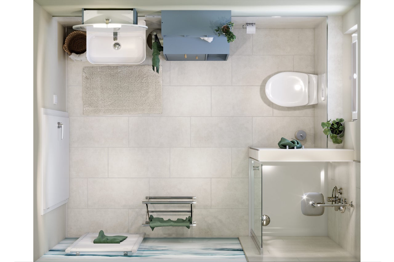 Salle de bains avec lavabo, toilettes, douche et radiateur sèche-serviettes dans une atmosphère claire et conviviale.