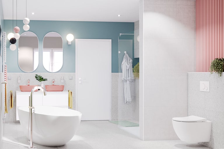 Salle de bain moderne avec baignoire, lavabos et toilettes