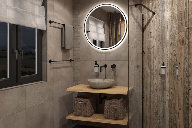 Salle de bains moderne avec lavabo, miroir avec éclairage, porte-serviettes et éléments en bois.