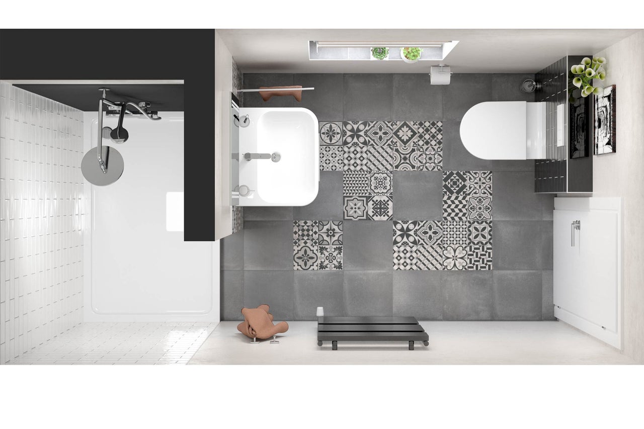 Vue de dessus d'une salle de bains avec douche, lavabo, toilettes et motifs de carreaux