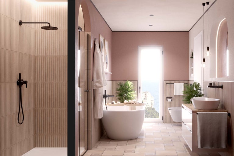 Salle de bains lumineuse avec douche, baignoire îlot, lavabo et toilettes