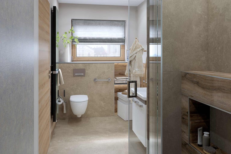 Salle de bain lumineuse avec toilettes, lavabo, douche et fenêtre