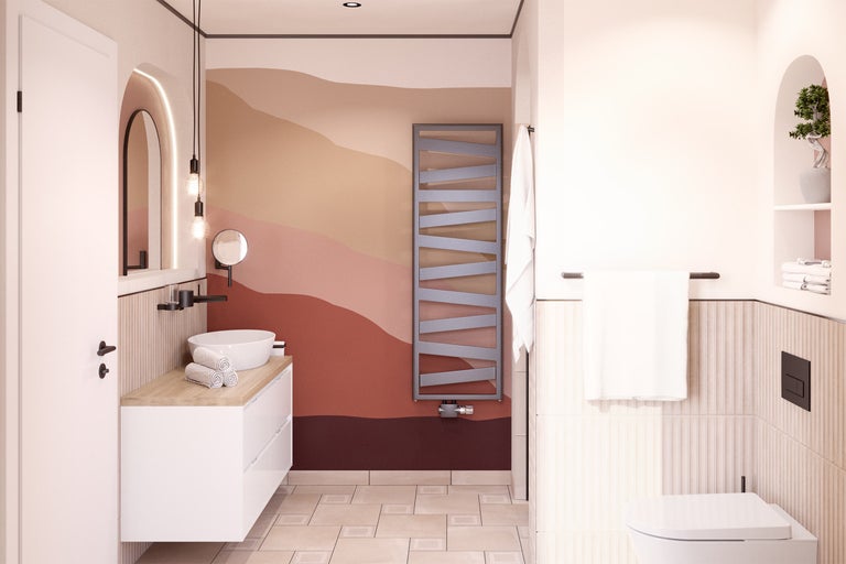 Salle de bain lumineuse avec lavabo, sèche-serviettes et décoration murale abstraite pour une ambiance moderne