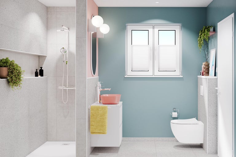 Salle de bain moderne avec douche, lavabo, toilettes et fenêtre