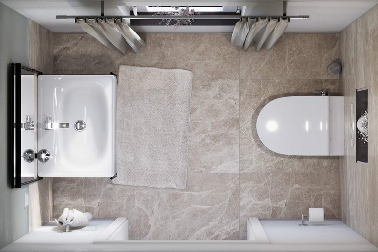 Badezimmer mit Badewanne, Toilette, Waschbecken und Badteppich aus der Vogelperspektive