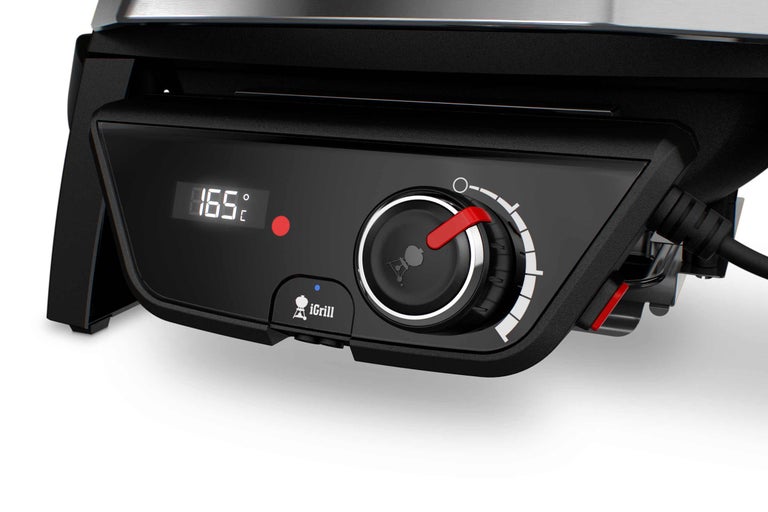 Nahaufnahme der Temperaturanzeige und des Einstellknopfes eines Weber Grills