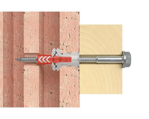 Befestigung eines Bolzens mit Dübel in einer Ziegelwand und einem Holzstück