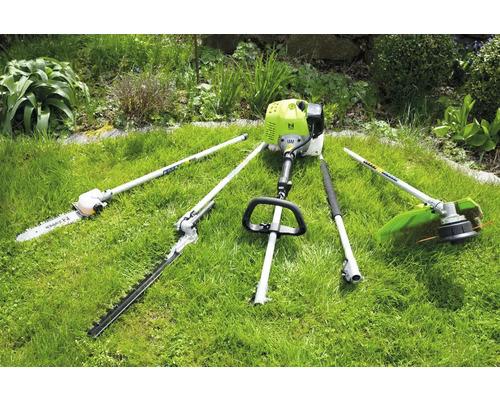 Outil de jardin multifonctionnel avec tronçonneuse, taille-haie et coupe-bordures sur gazon