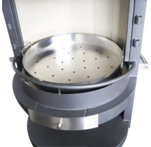 Vue détaillée d''un poêle à bois avec tôle perforée